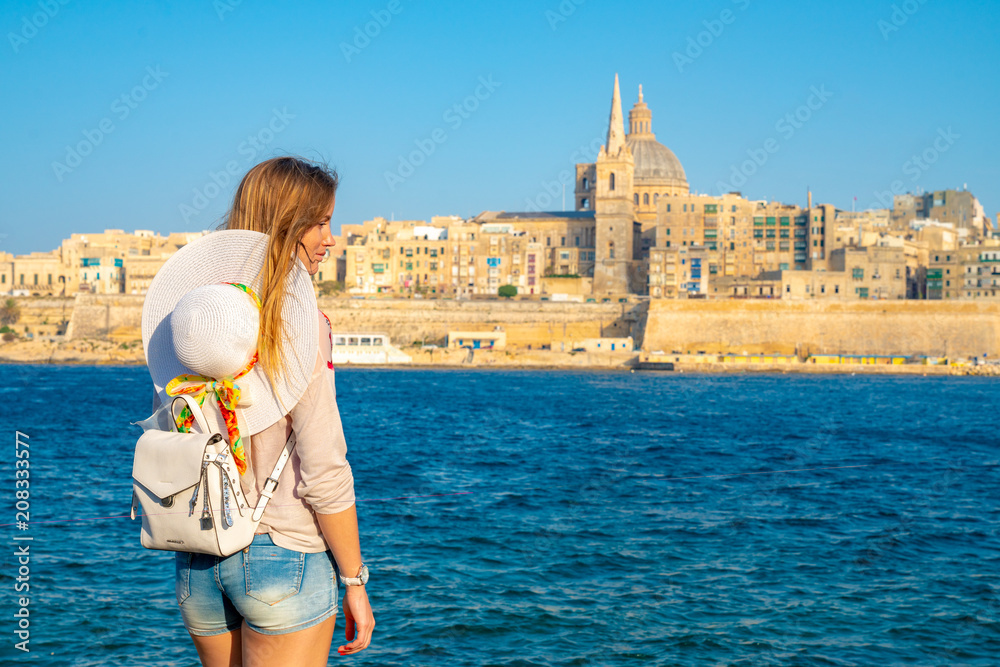 Girl exploring Valletta old town on Malta.